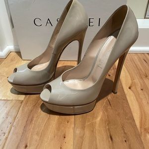 Casadei Peeptoe platform pumps in Softymetal Ecru. Sz 39